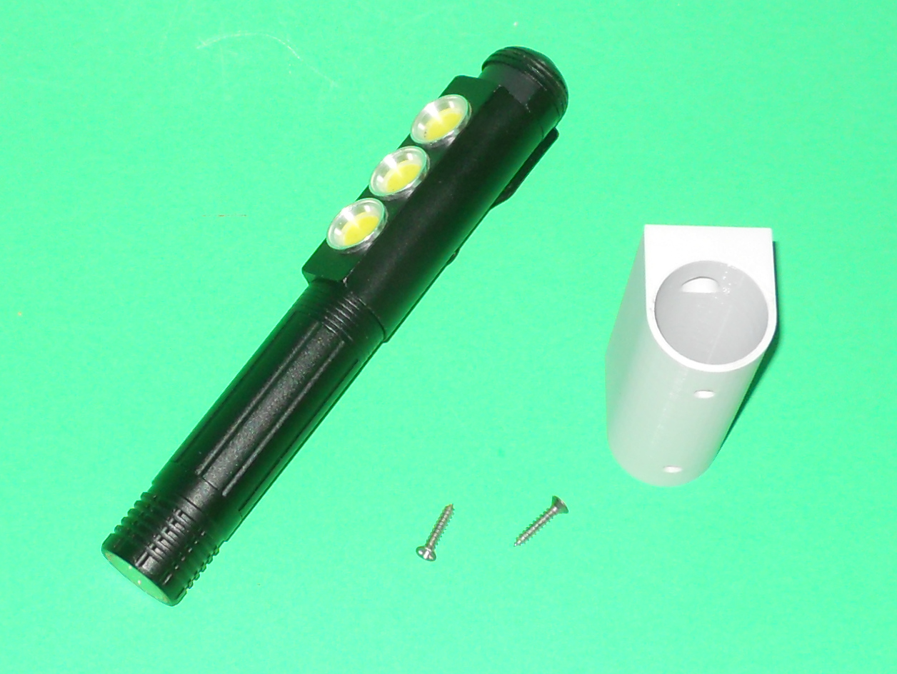 Small flashlight holder